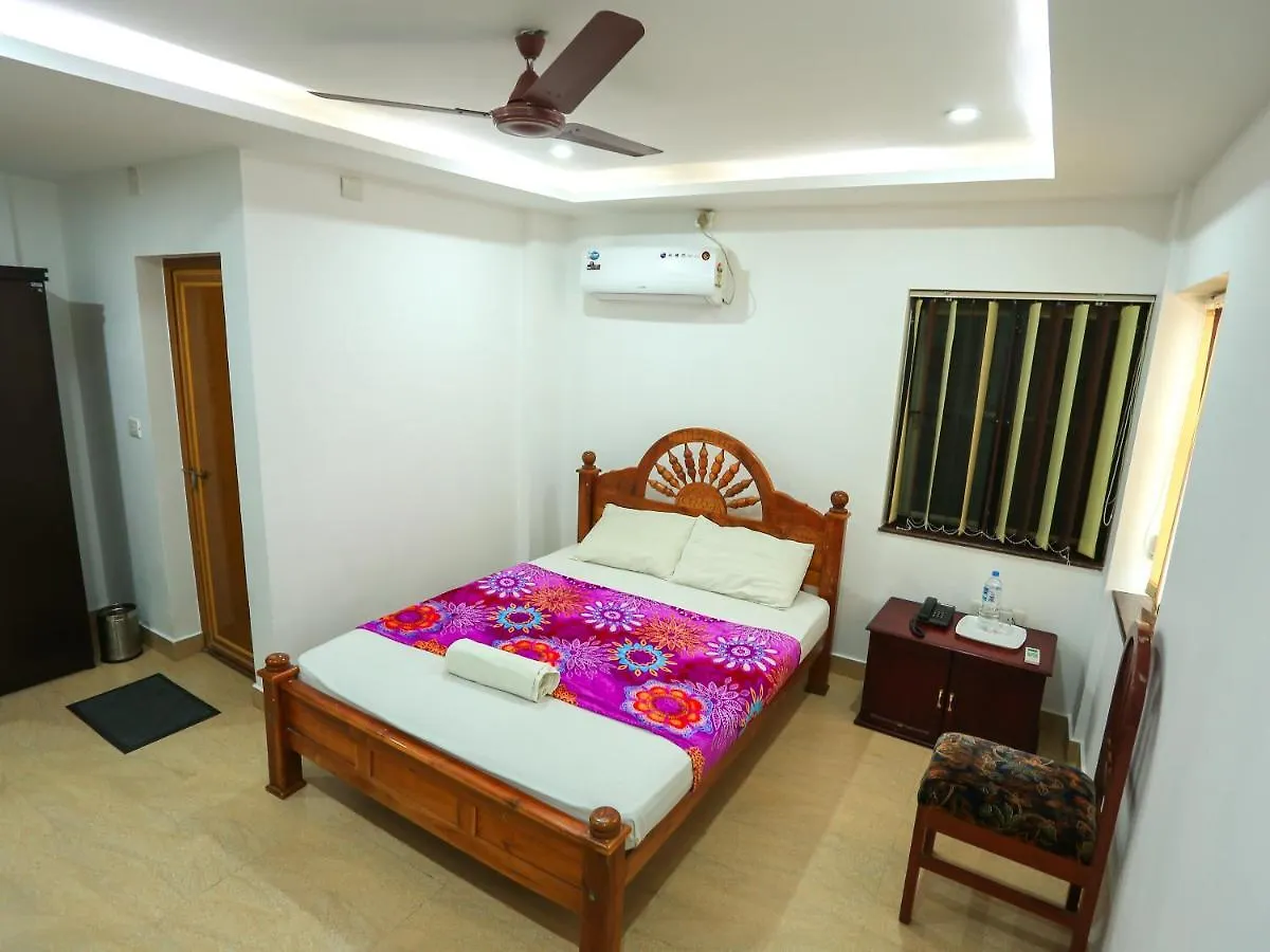 Hare Krishna inn Guruvāyūr Hotell